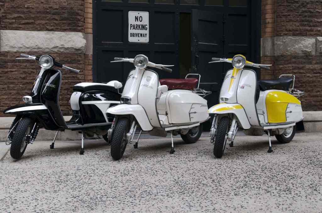 Name:  3scootsJune08.jpg
Views: 1239
Size:  67.9 KB